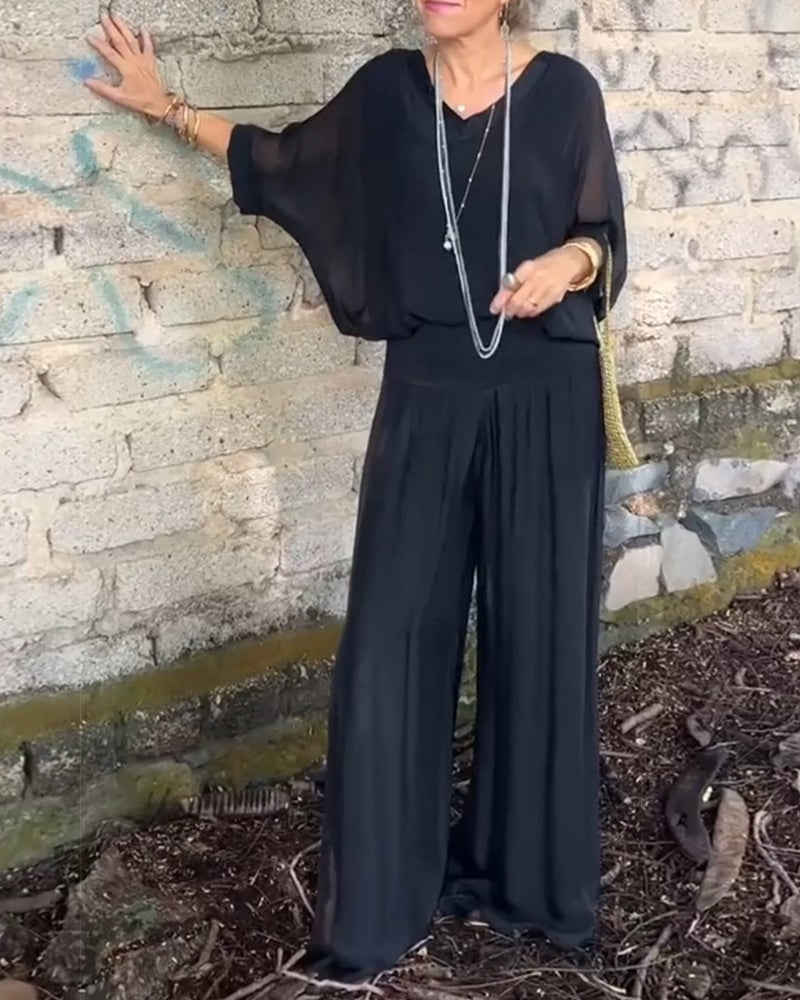 Ensfarvede bukser og bluse med V-udskæring | To-delt sæt