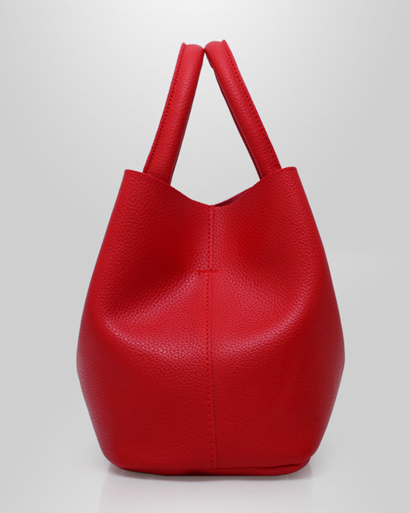 Stilfuld skuldertaske eller bucket bag