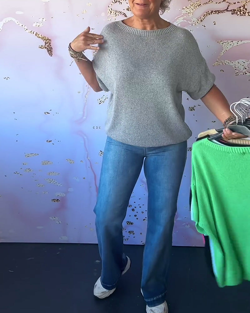 Løs ensfarvet pullover med rund hals