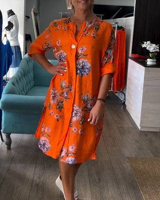 Orange kjole med knapper og print