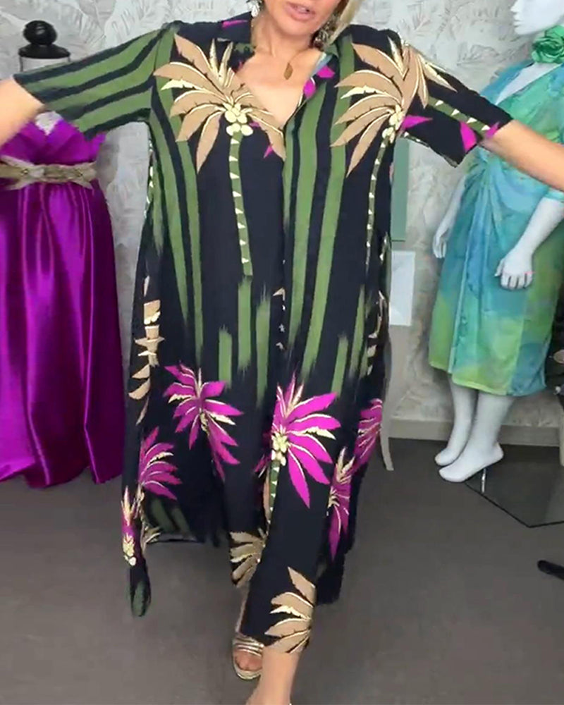 Kortærmet kjole med slids og palmemotiv