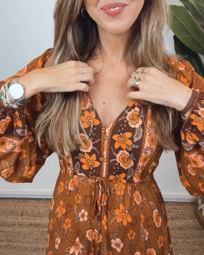 Lang blomsterprint med V-udskæring og lanterneærmer