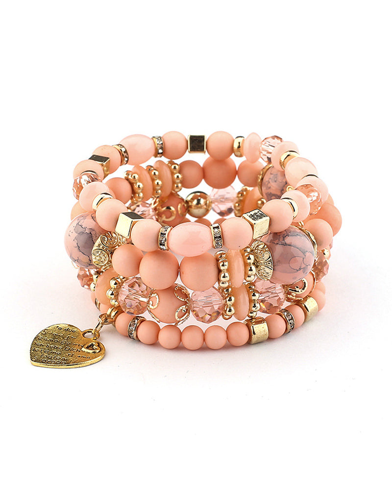 Lagdelt hjerteperlearmbånd