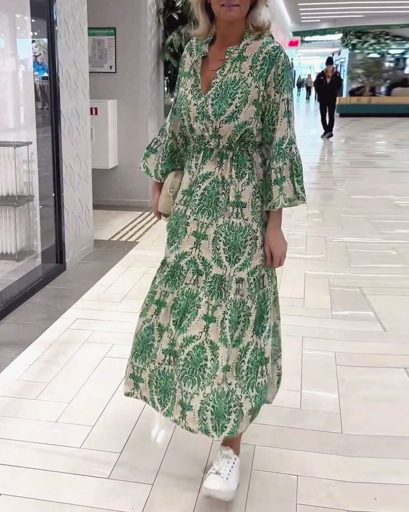 Mønstret kjole med klokkeærmer og snøre