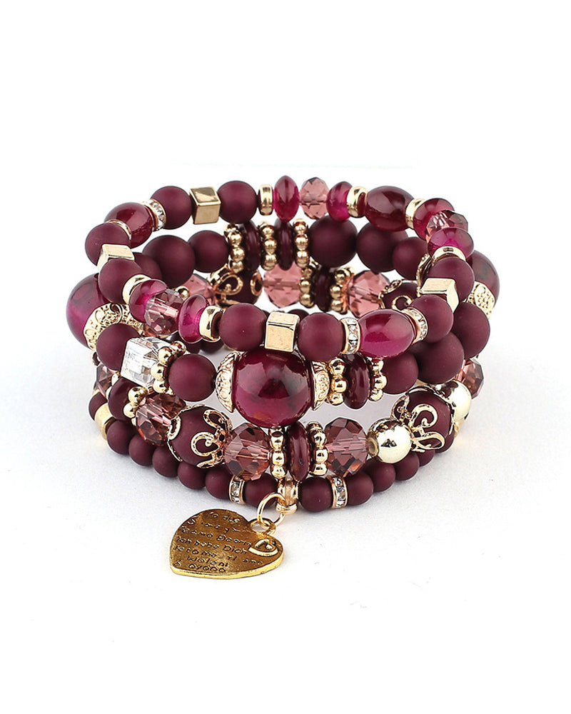 Lagdelt hjerteperlearmbånd