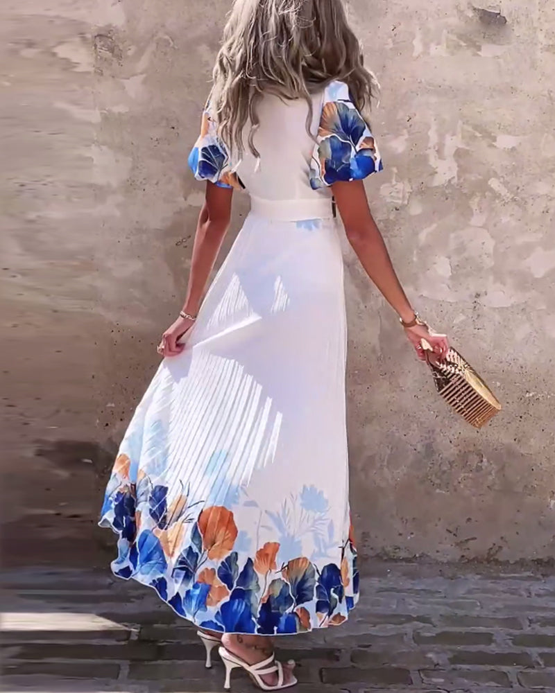 Kjole i dyb V-stil med bobleærmer