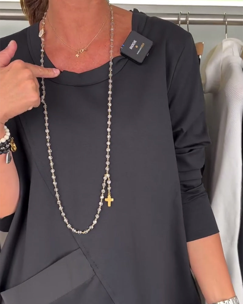 Sort patchwork kjole med stor forlomme