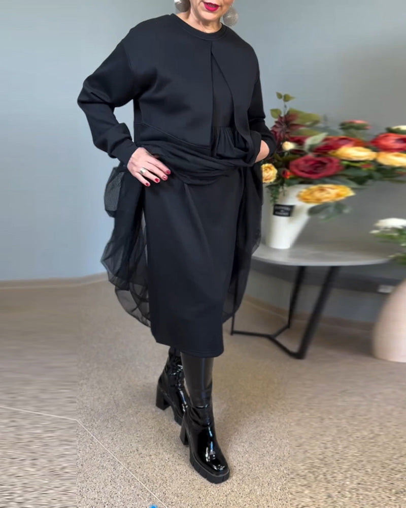 Elegant kjole med gennemsigtigt yderlag