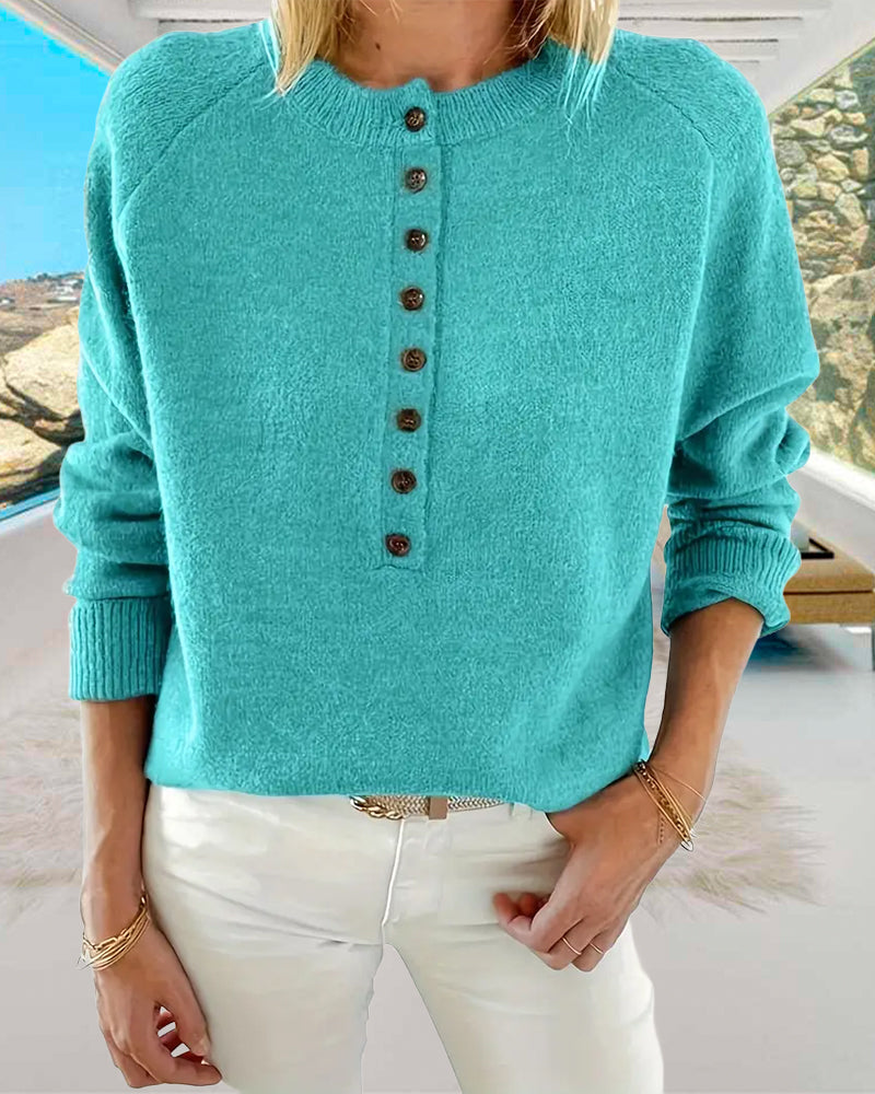 Frisk turkisfarvet sweater med henley-krave