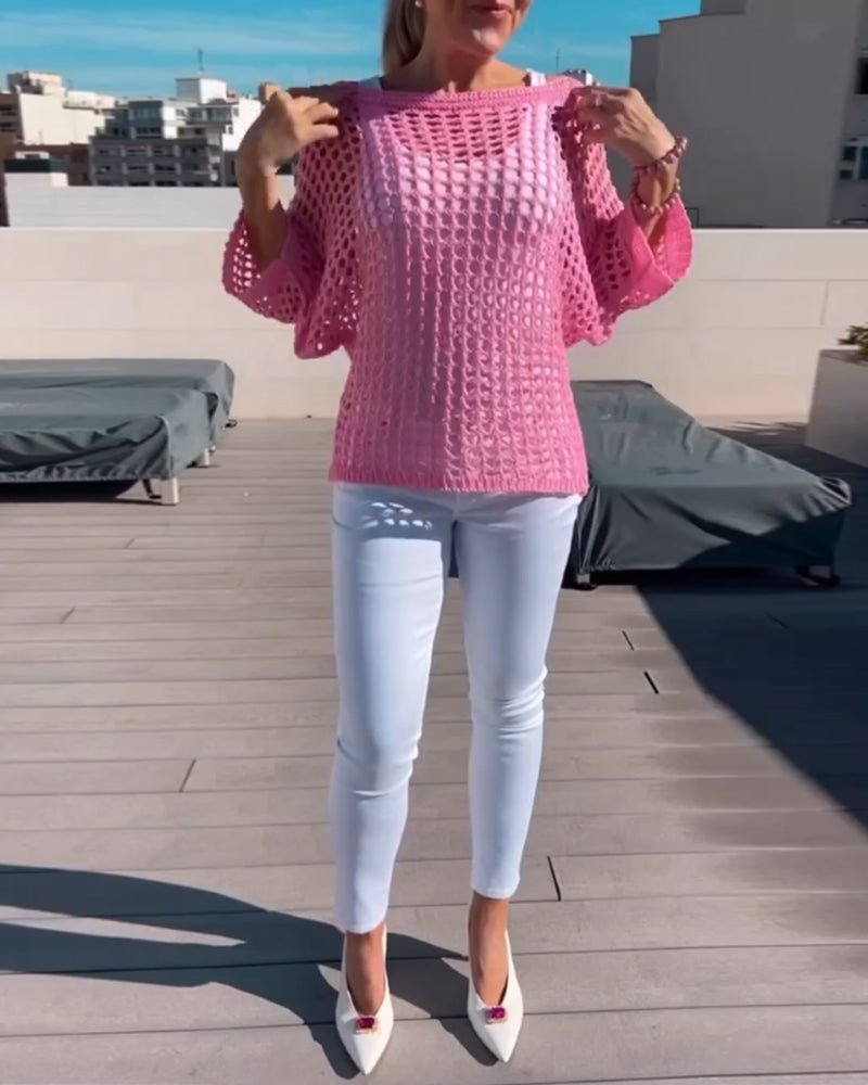 Ensfarvet top i udhulet netdesign