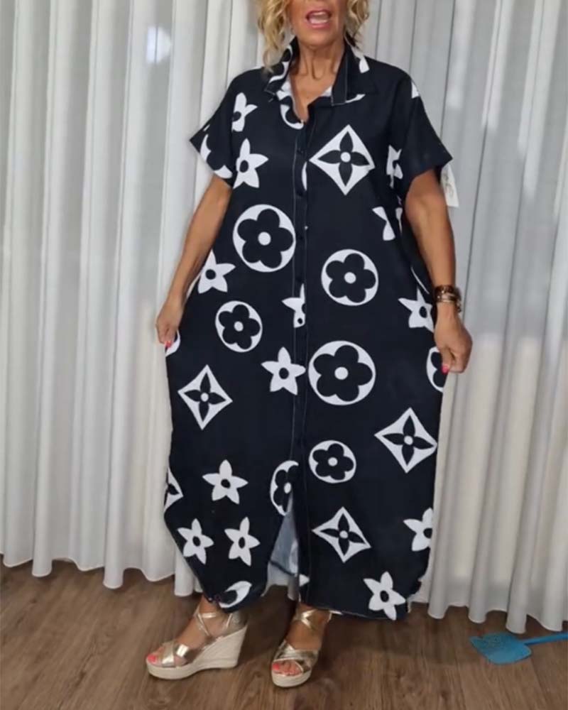 Sort kjole med reverskrave og monogram print