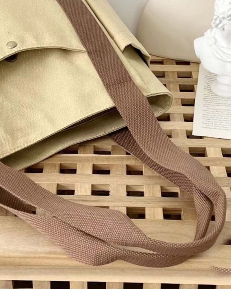 Kanvastaske med dobbelte hanke og stor kapacitet