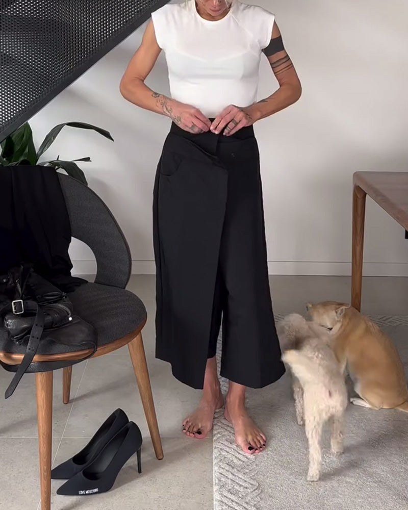 Højtaljede sorte bukser med tværgående lukning