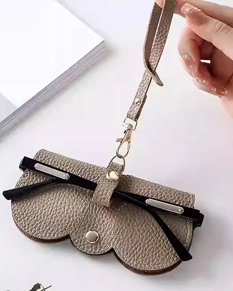 Stilfuldt solbrilleetui