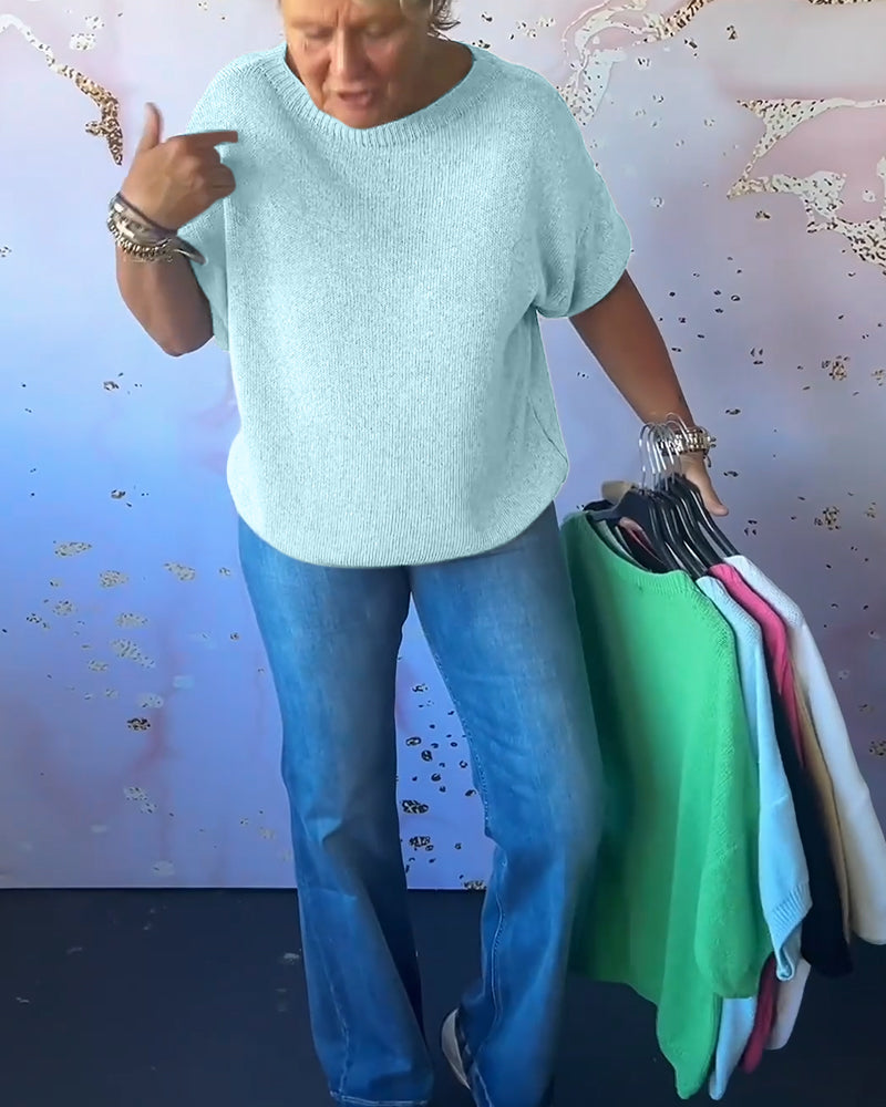 Løs ensfarvet pullover med rund hals