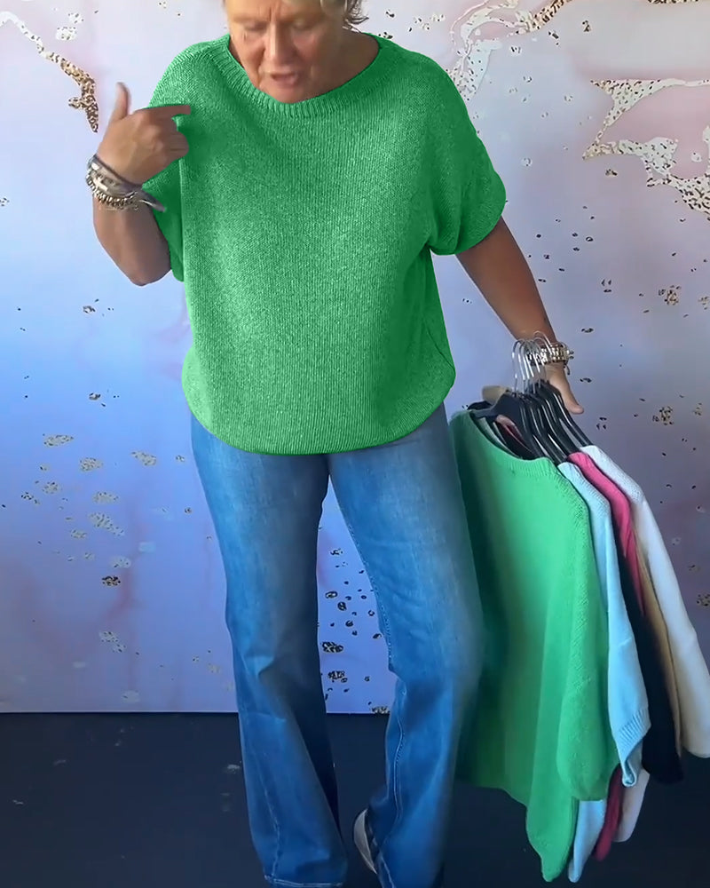 Løs ensfarvet pullover med rund hals