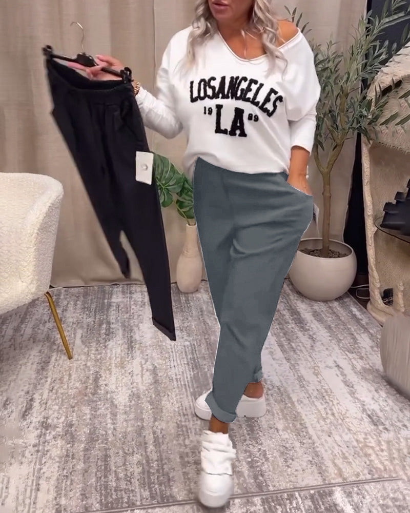 Sorte træningsbukser med lommer