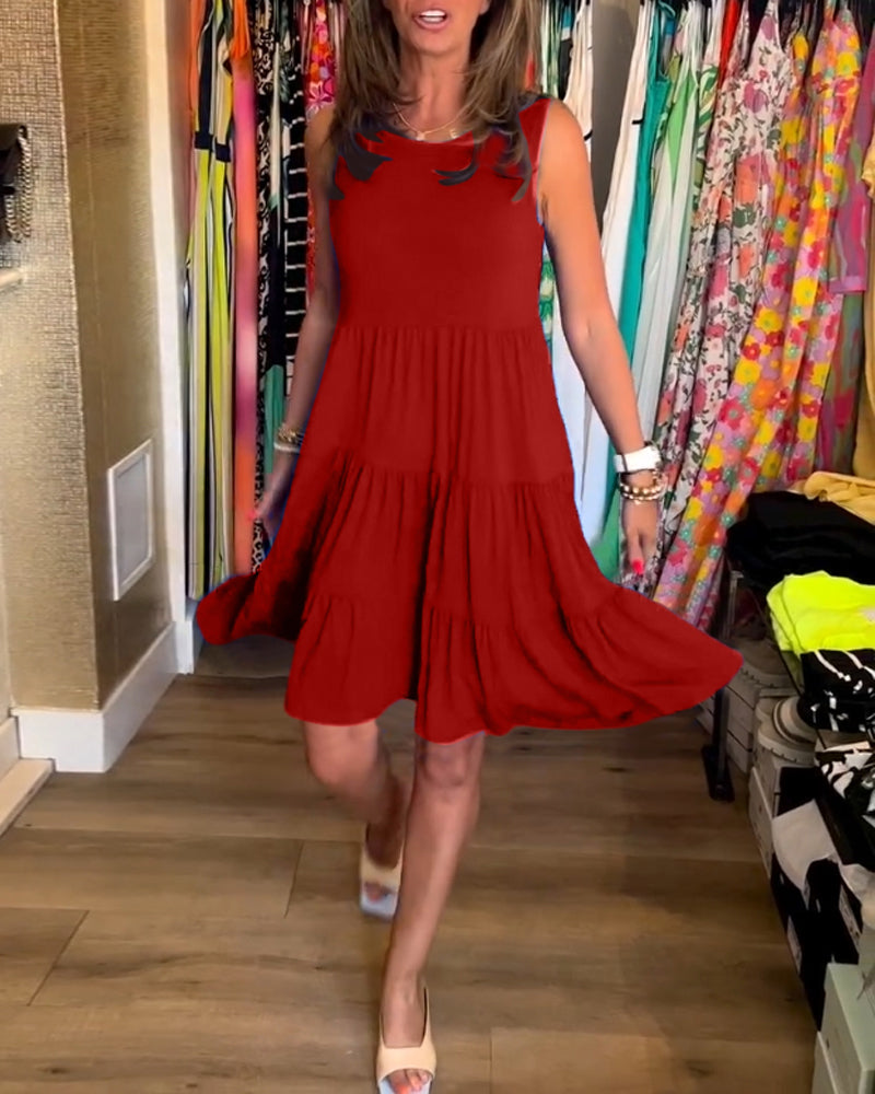 Blå ærmeløs kjole med plisseret nederdel