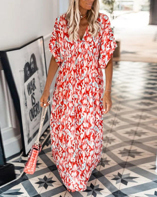 Stilfuld V-halset sommerkjole med korte ærmer