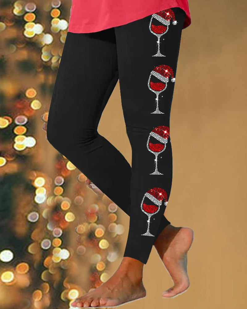 Juleleggings med rødvinsglas og nissuehue print