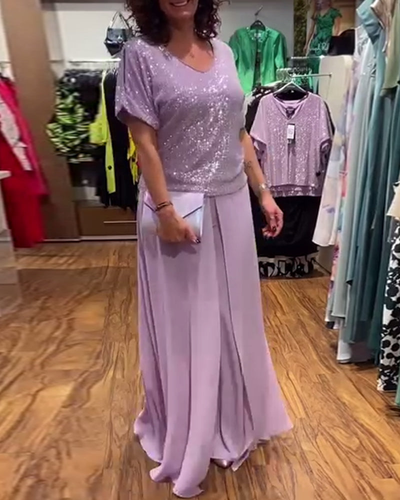 V-halset kortærmet bluse med pailletter