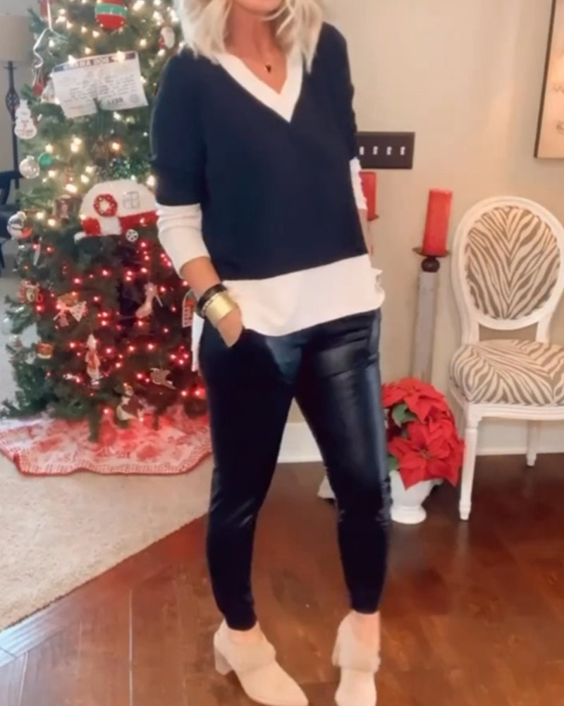 Top med kontrastfarvet v-halsudskæring