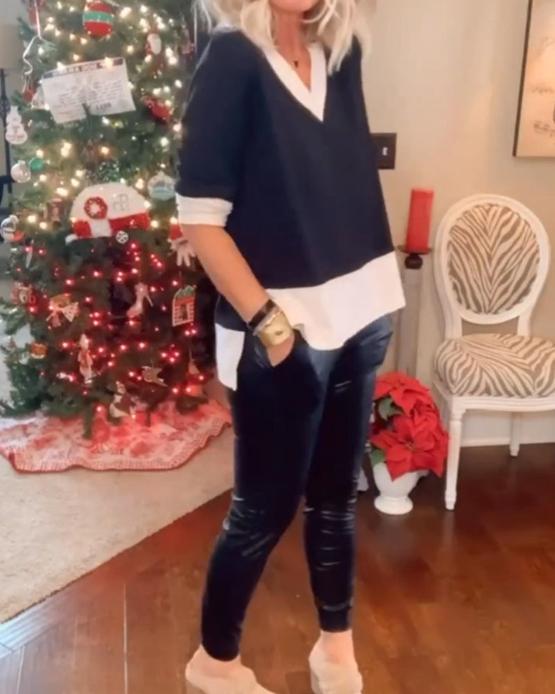 Top med kontrastfarvet v-halsudskæring