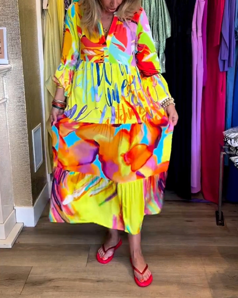 Farverig kjole med vide ærmer