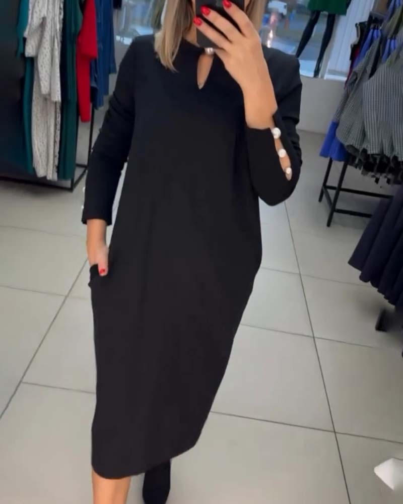 Elegant kjole med perleknapper