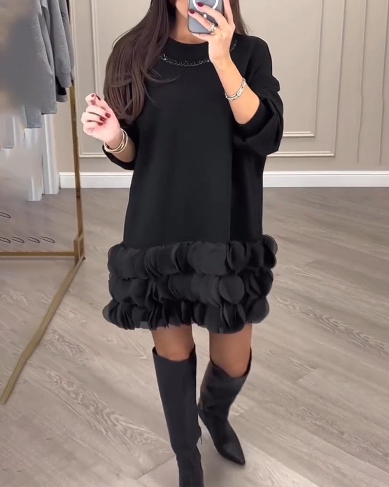 Elegant kjole i kronblade-design