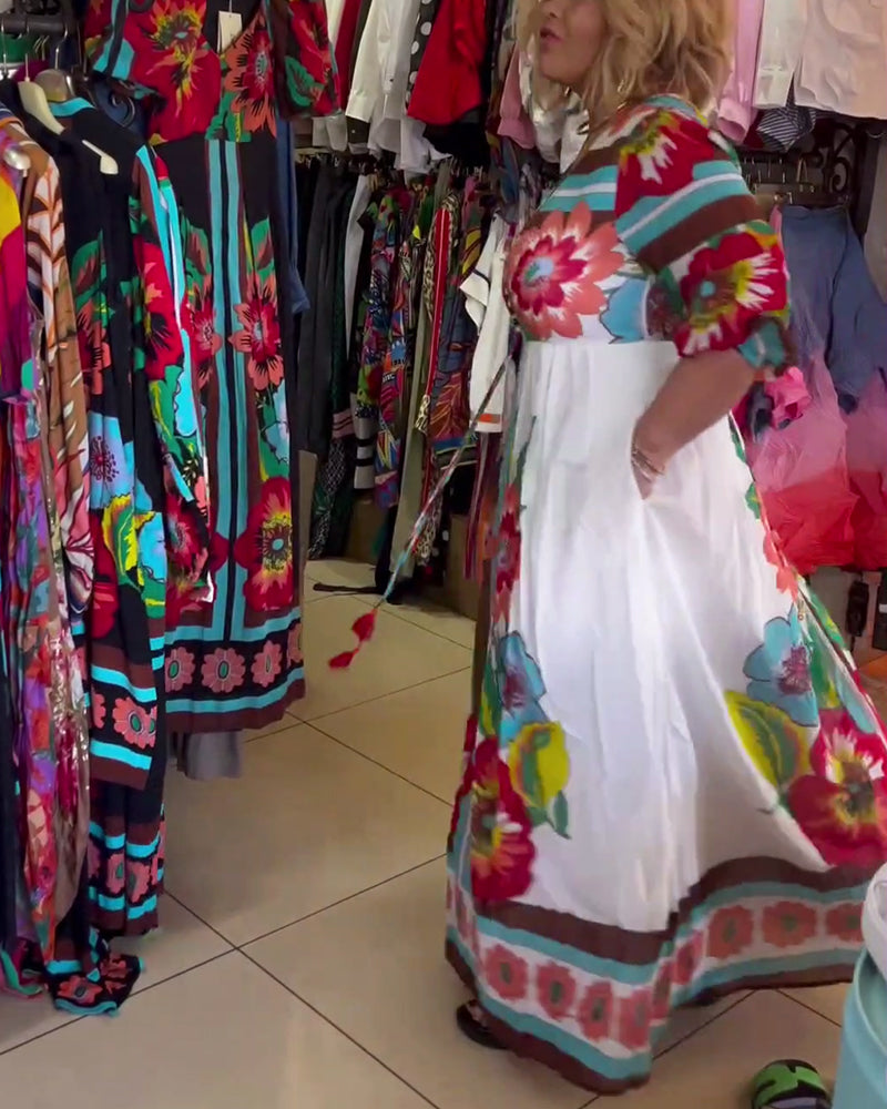 Lang blomsterkjole med svaj