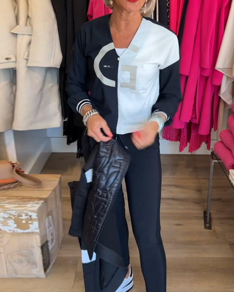 Top med V-udskæring og sort-hvid farveblok