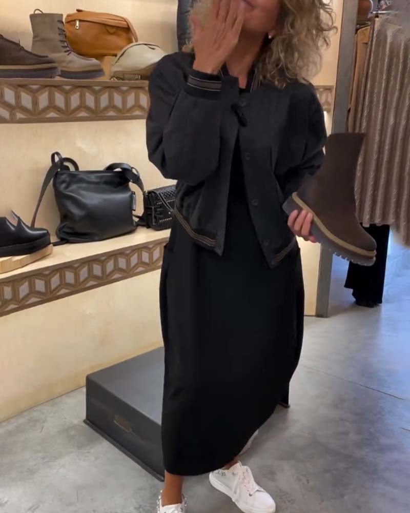 Afslappet ensfarvet bomberjakke med ståkrave og knapper