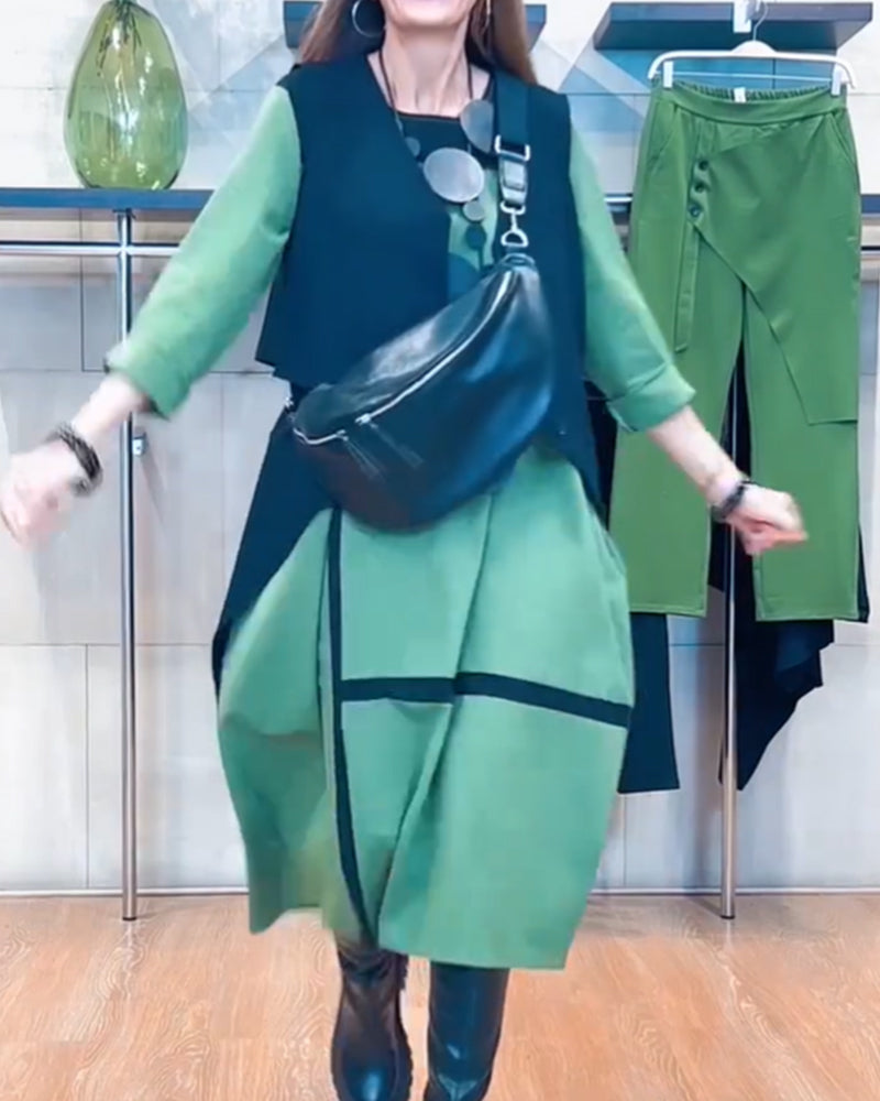 Stilfuld kjole med lodrette striber