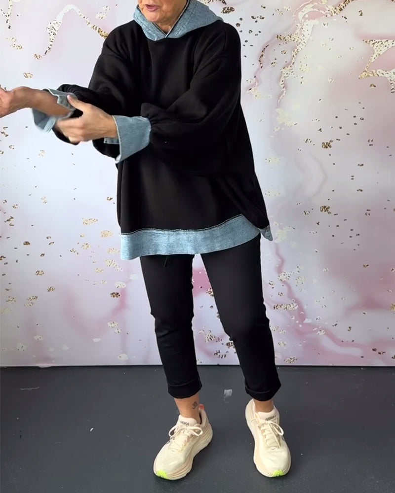 Afslappet hættetrøje med kontrastfarvede kanter