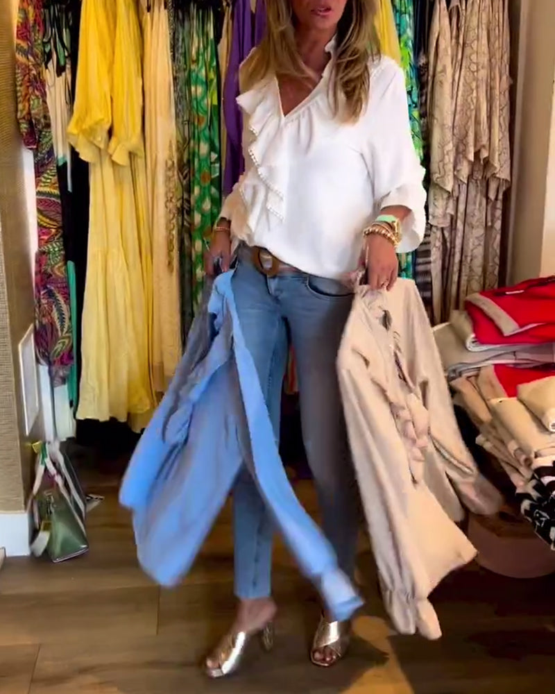 Hvid designerbluse med flæser