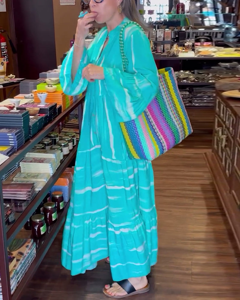 Afslappet løs lang kjole med V-udskæring og vide ærmer