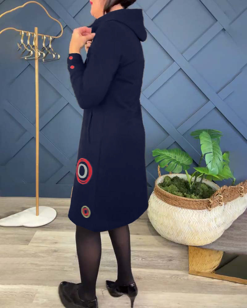 Afslappet kjole med hætte og cirkelprint