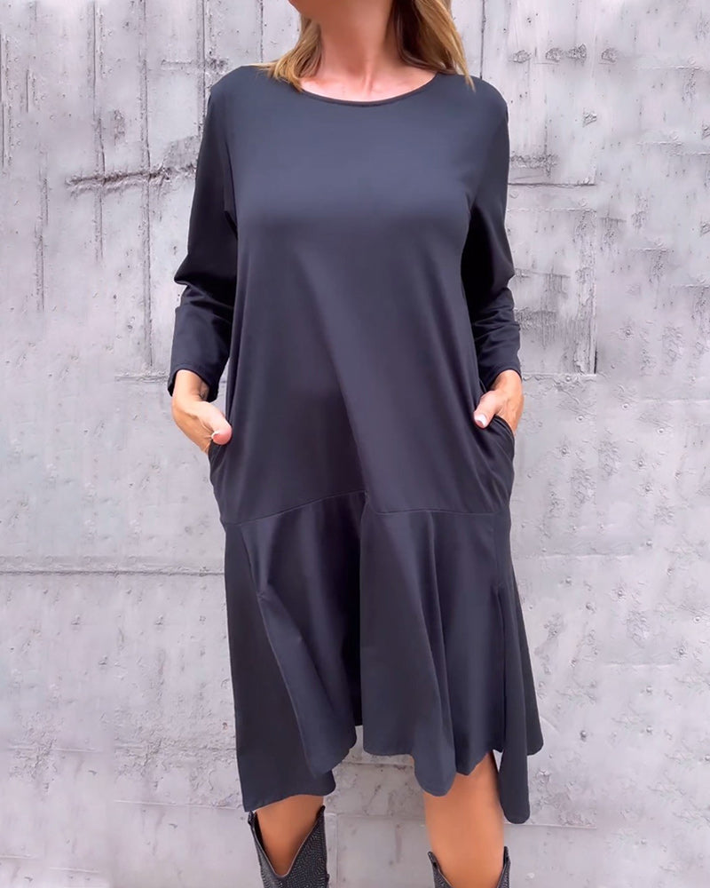 Kjole i løs pasform og lommer