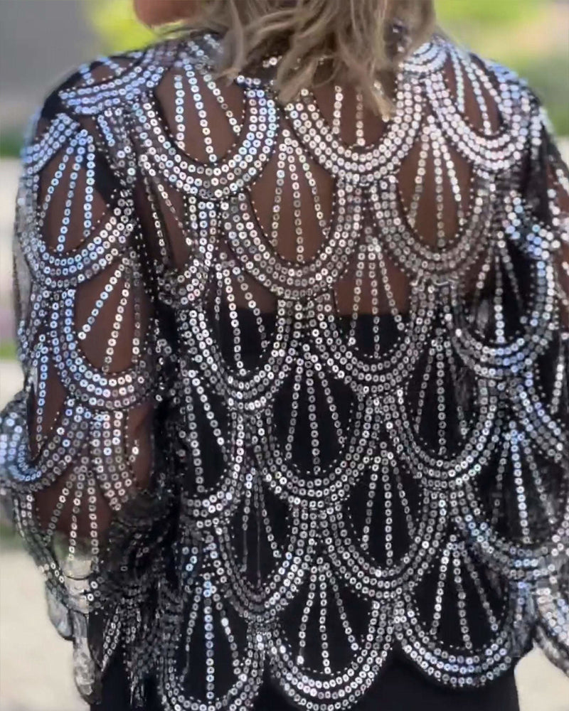 Elegant gennemsigtig sportscoat med pailletter og bølgekanter