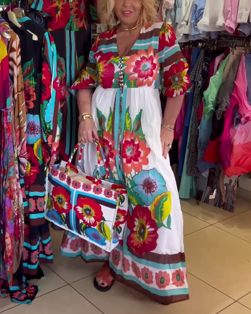 Lang blomsterkjole med svaj