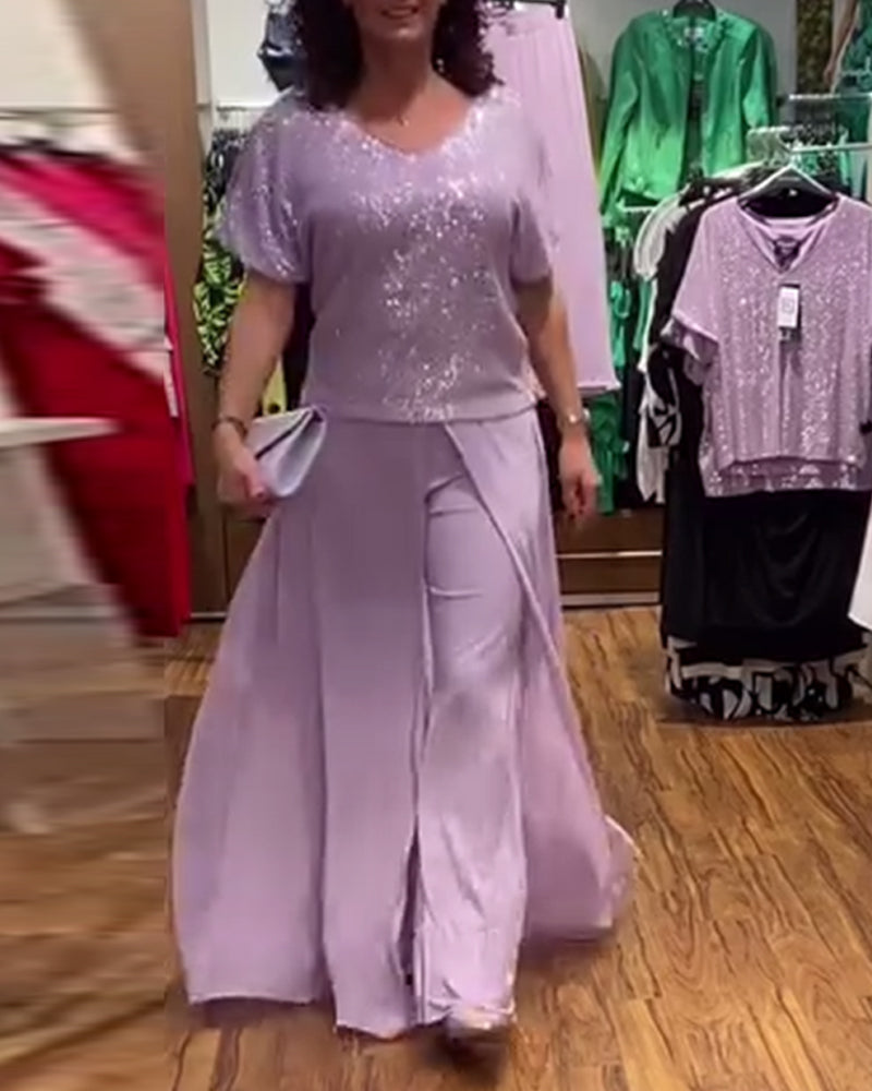 V-halset kortærmet bluse med pailletter