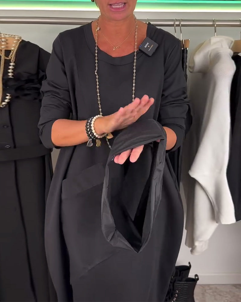 Sort patchwork kjole med stor forlomme