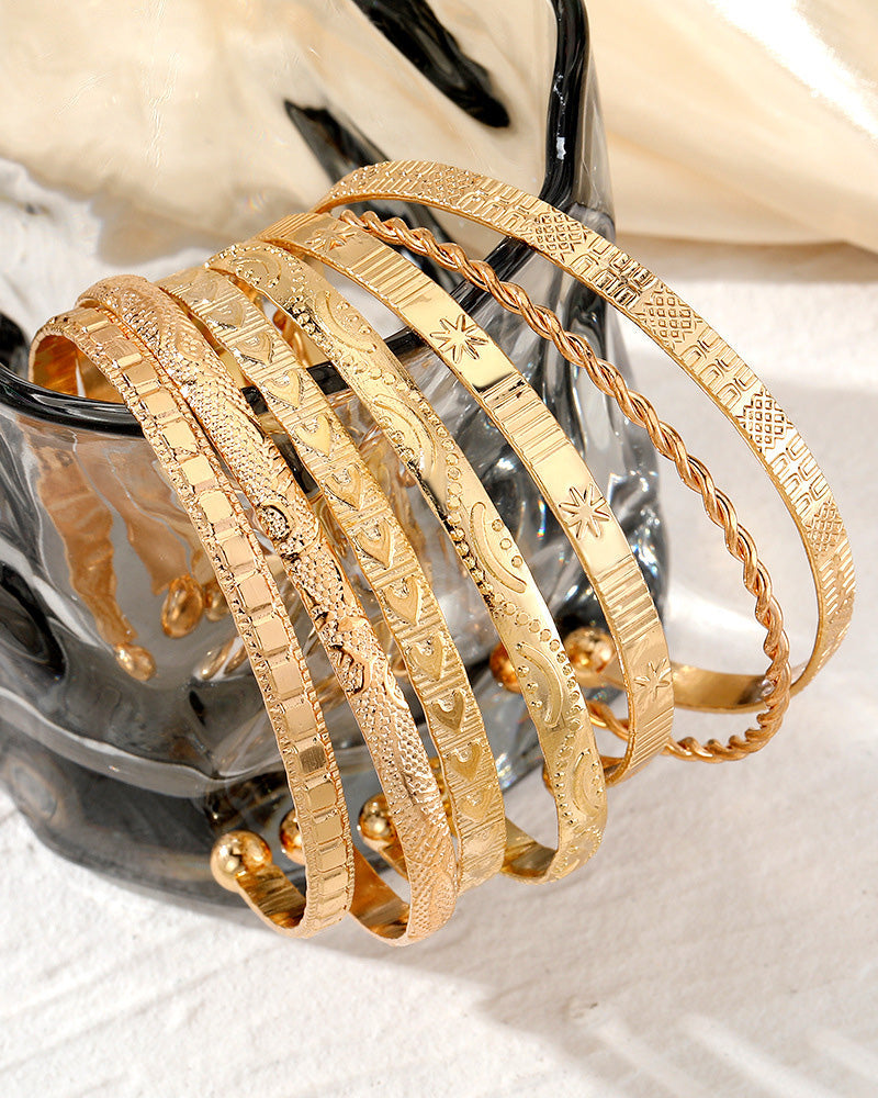 Guld armbåndssæt i 7 dele