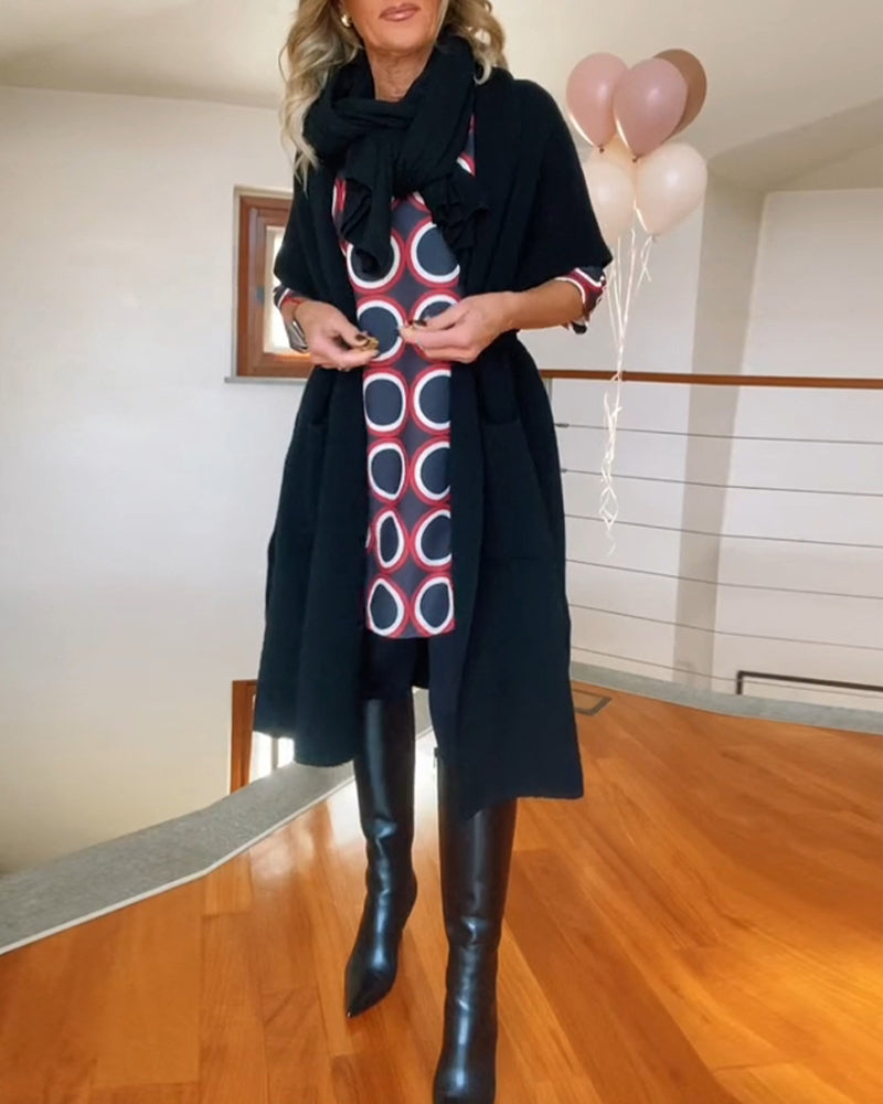 Lang sort cardigan med lommer og halve ærmer