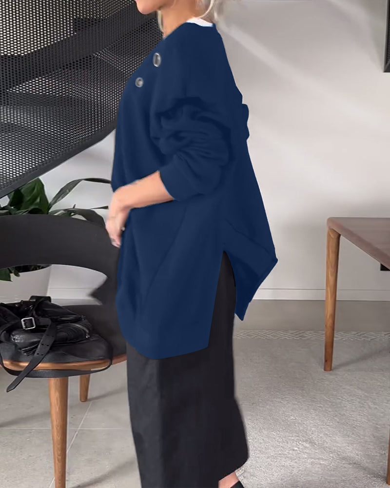 Sort sweater i løs pasform med slids