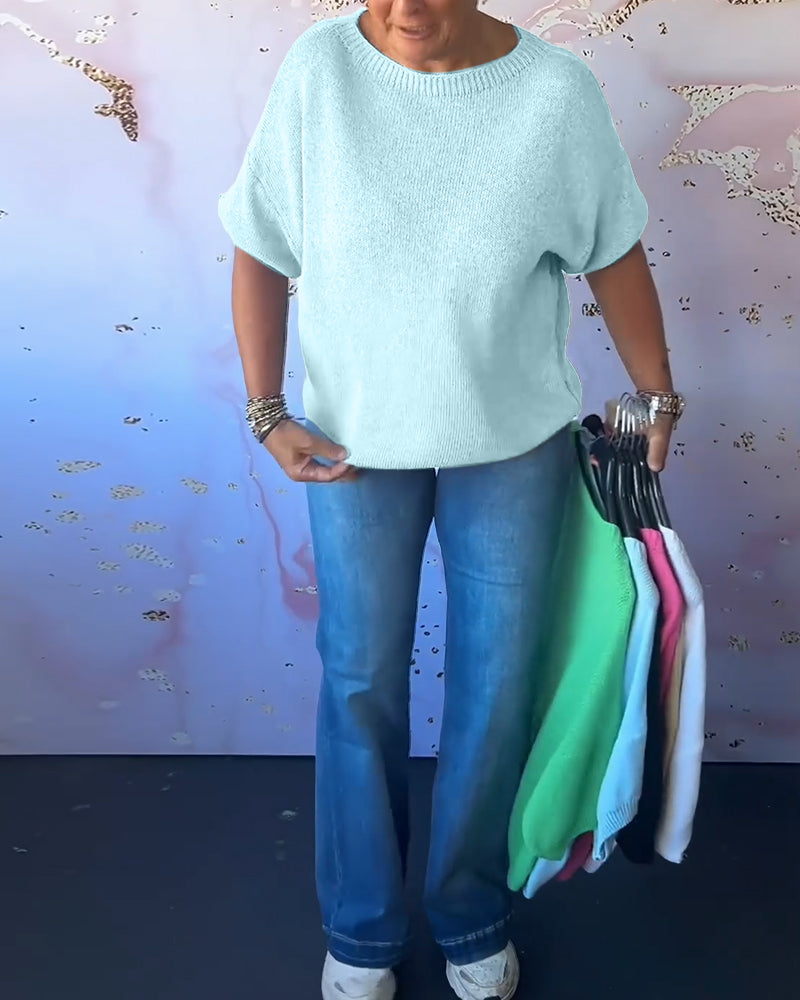 Løs ensfarvet pullover med rund hals