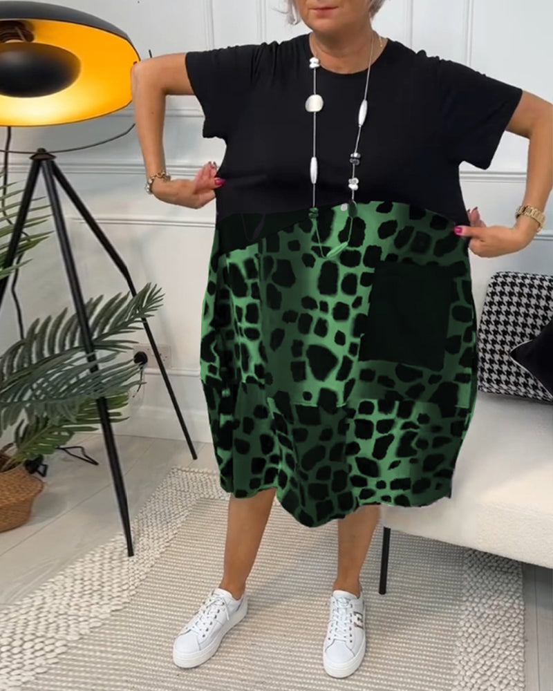 Sort patchwork kjole med rund halsudskæring