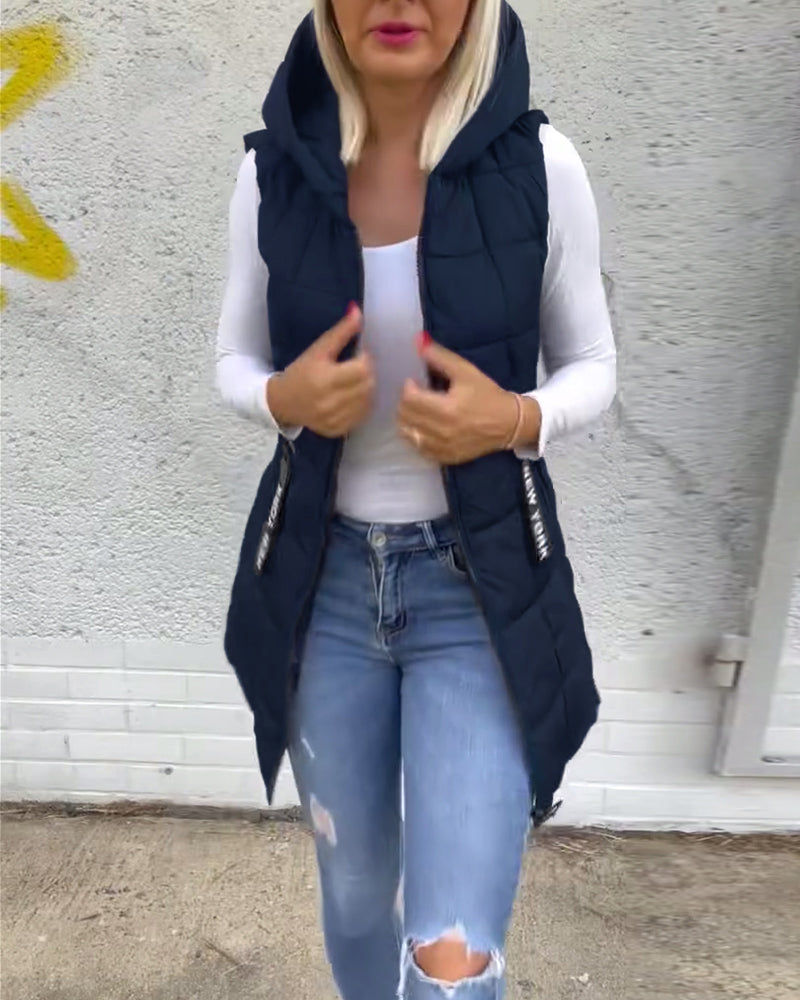 Vatteret vest med lynlås og hætte