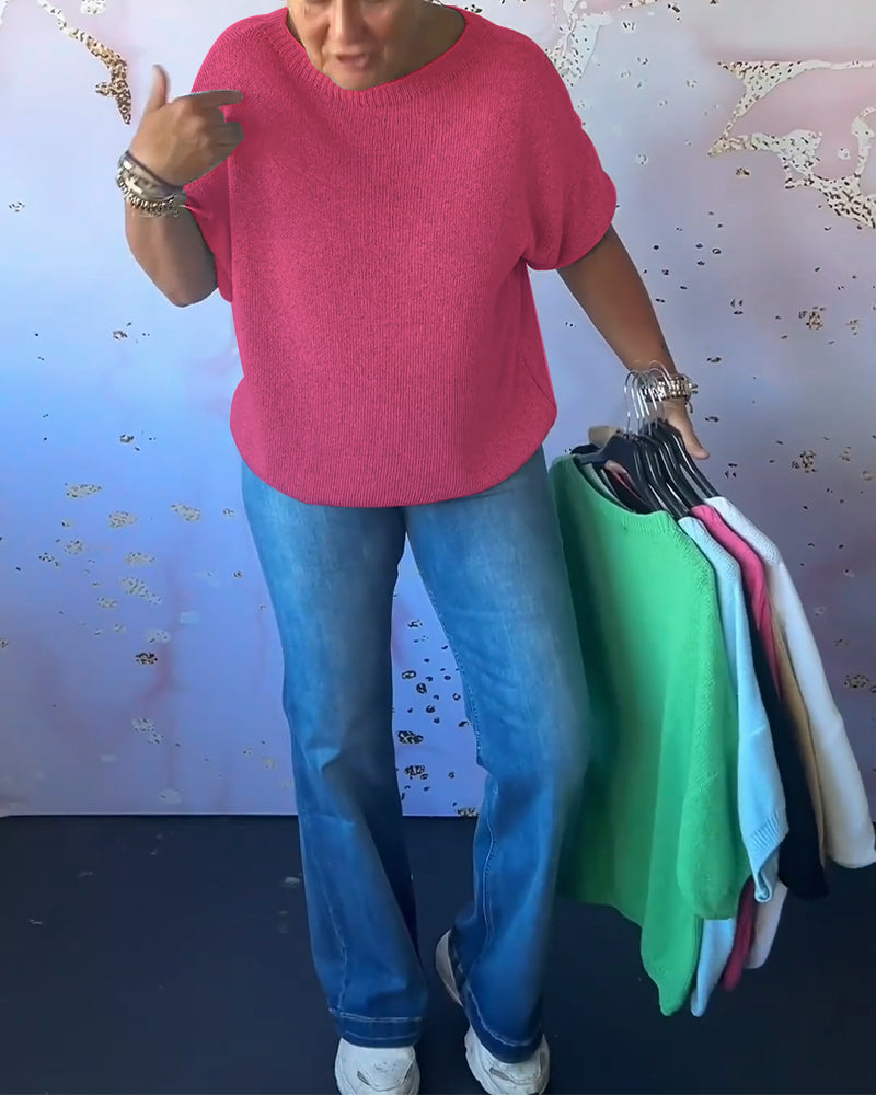 Løs ensfarvet pullover med rund hals